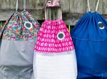 At last! Now my kids are happy to pick up their laundry and put it in these fishy laundry bags I made them. Love this pattern. Look great in a fishy print too, but net works well. Could be a swim bag too?