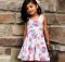 Sahara sewing pattern. Girls knit dress with circle skirt and scoop neck.